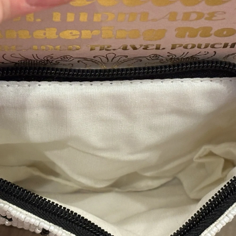 NWT Wandering Moon hand beaded travel pouch with black and white Bow Design